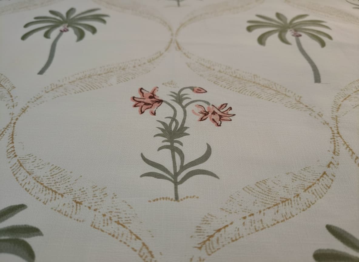 Emenaura festive hand-block printed bed sheet set with two embroidered cushion covers, showcasing vibrant patterns and intricate details.