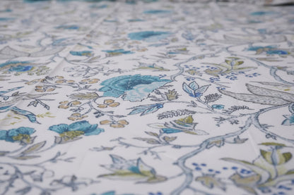 Two hand-block printed cotton bedsheets from Emenaura's The Festive Home collection, featuring intricate traditional patterns.