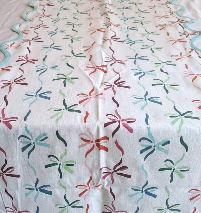 Emenaura Grand Festive Home bed sheet set with percale fabric and scallop-edged table runner, featuring intricate patterns and elegant design