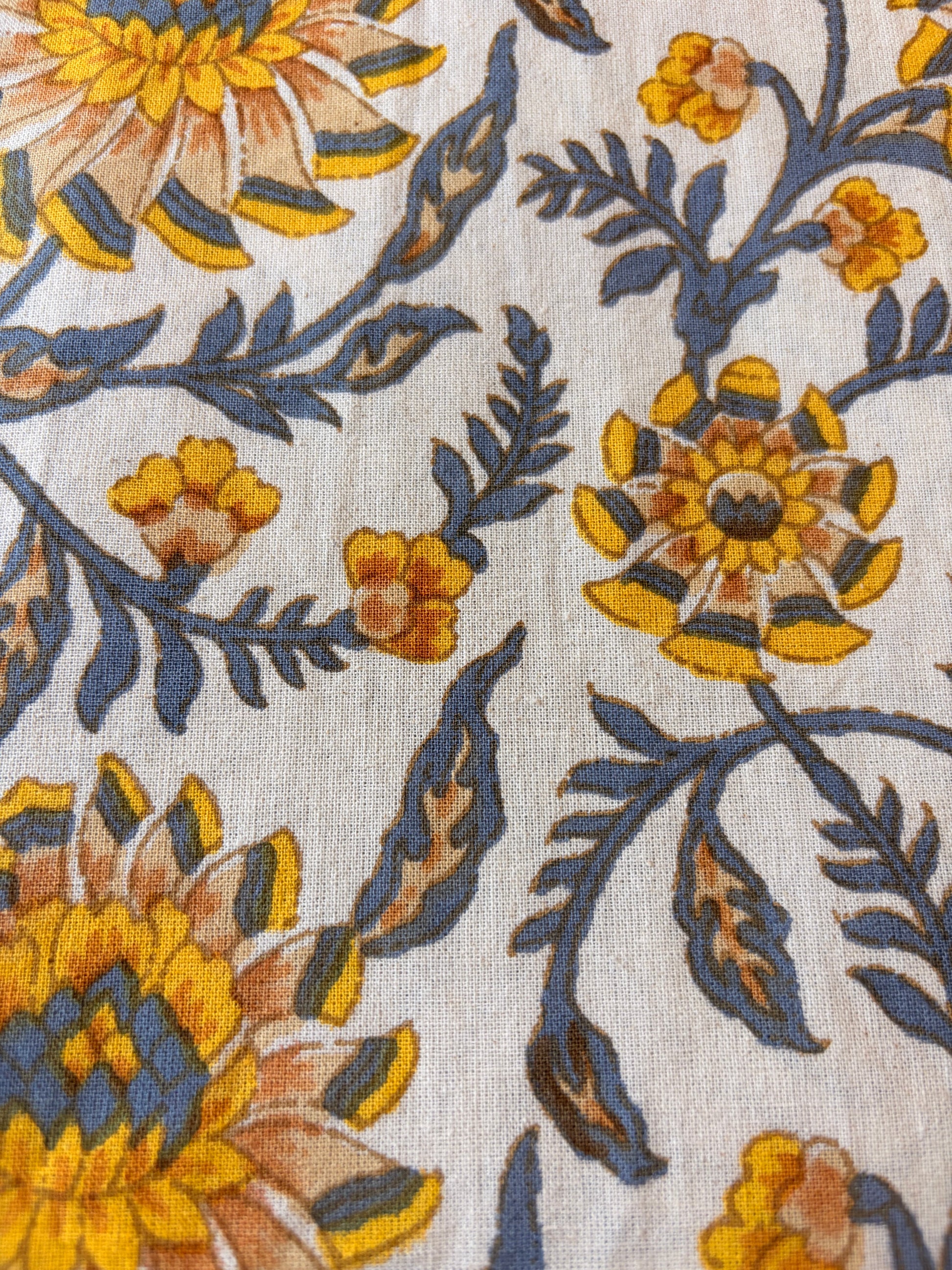 Sunlit Heritage Floral cotton bedsheet by Emenaura featuring a vibrant floral pattern and soft, breathable fabric for comfortable sleep.