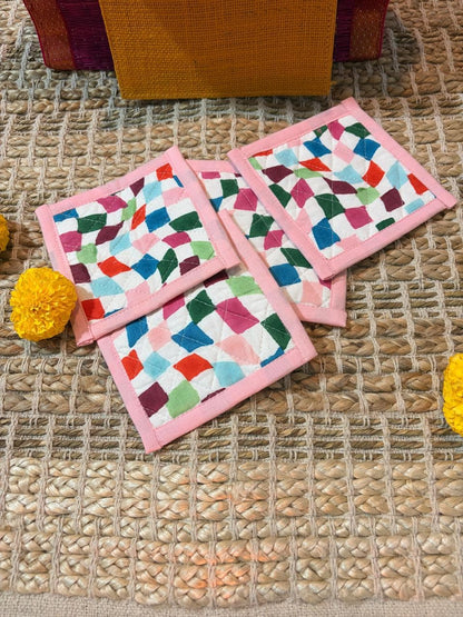 Emenaura Little Diwali coaster set with four colorful ceramic coasters in a pouch, includes a surprise gift.