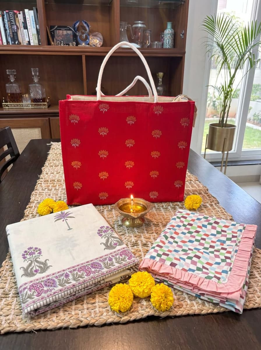 Violet percale bedsheet set and pastel table runner from Emenaura, perfect for a festive home decor.